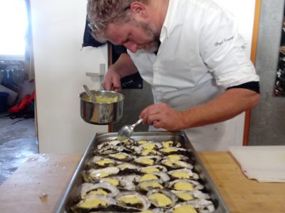 Lloyd Tropeano finishing an oyster plate